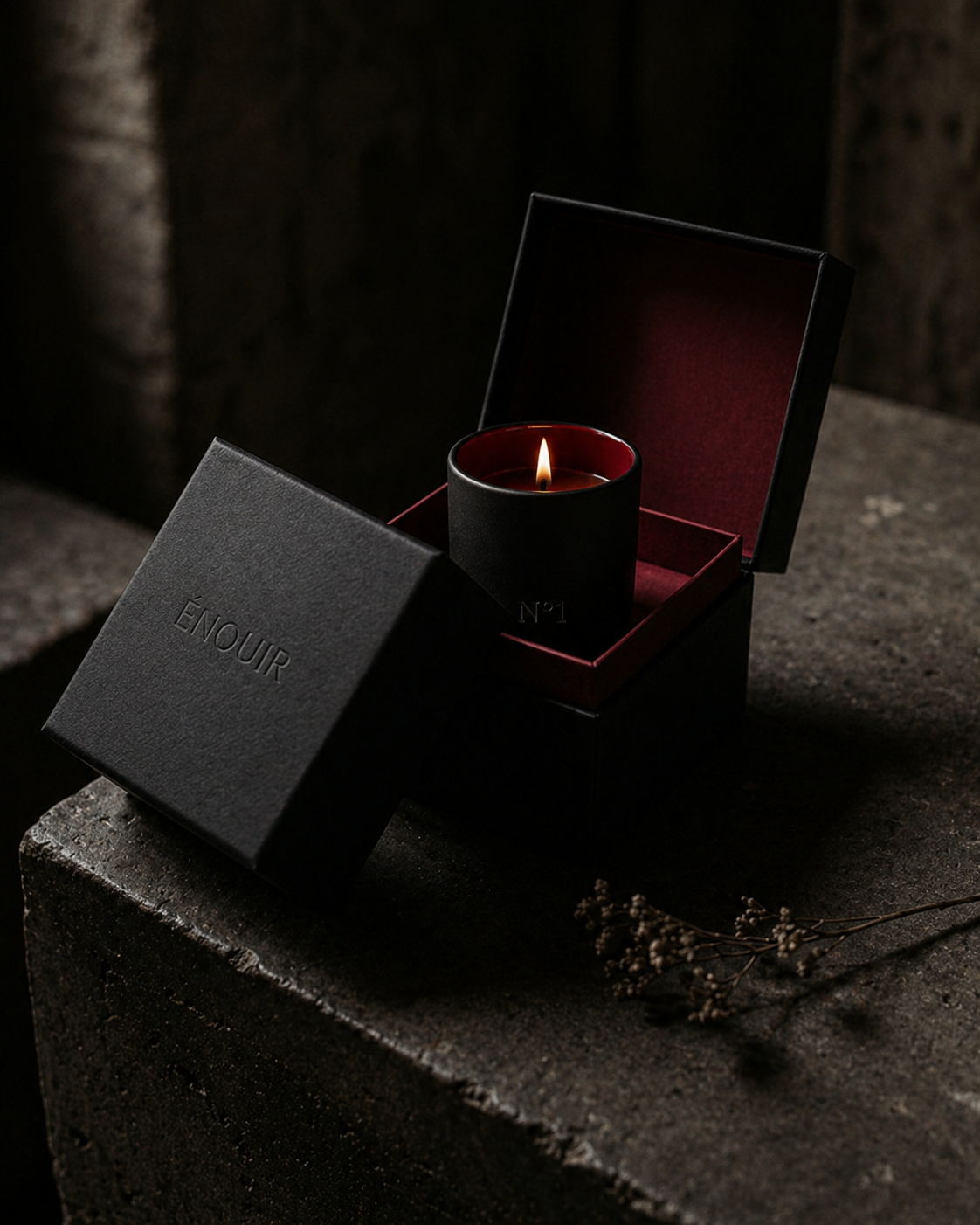 ÉNOUIR matte black cabinet-door box opening to crimson interior